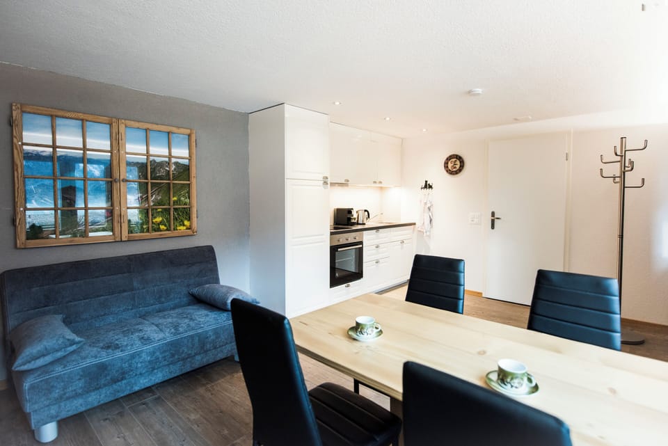 Standard Studio, Partial Lake View | Living area | 30-inch flat-screen TV with cable channels, TV
