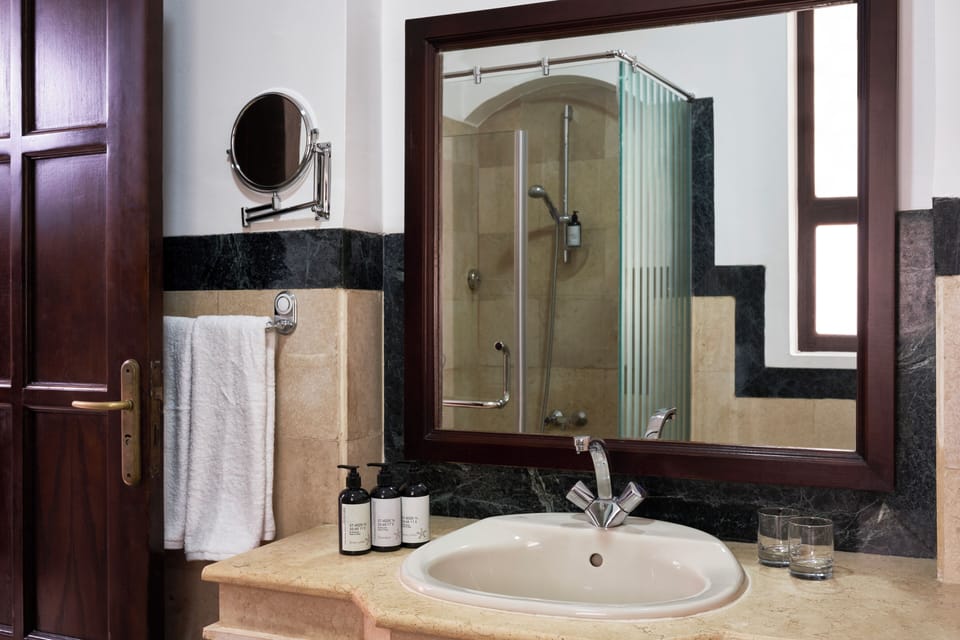 Shower, eco-friendly toiletries, hair dryer, bidet