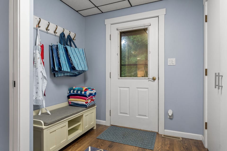 Entry into the house. Closet and washer/dryer located on the right.