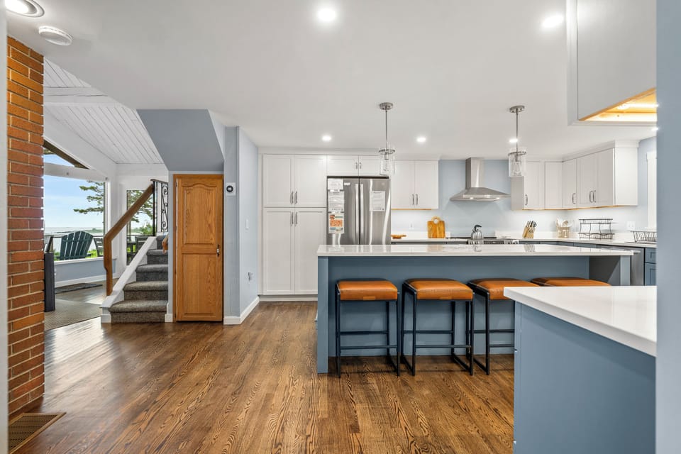 Newly renovated kitchen. Dining area and living room to the left.