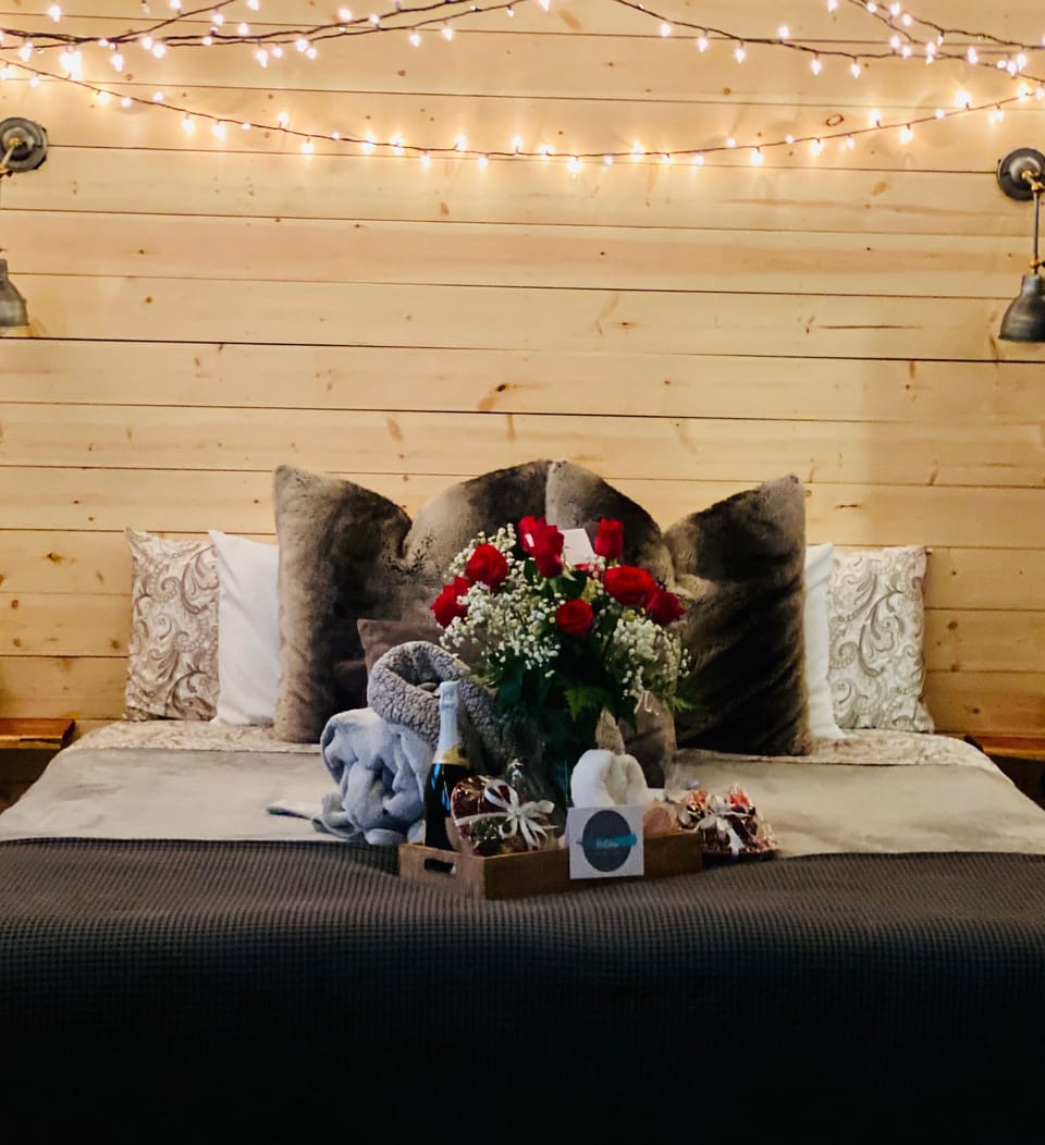 Our Amazing King Bed. Robes, Champagne, Hand Made Truffles. Roses optional 
