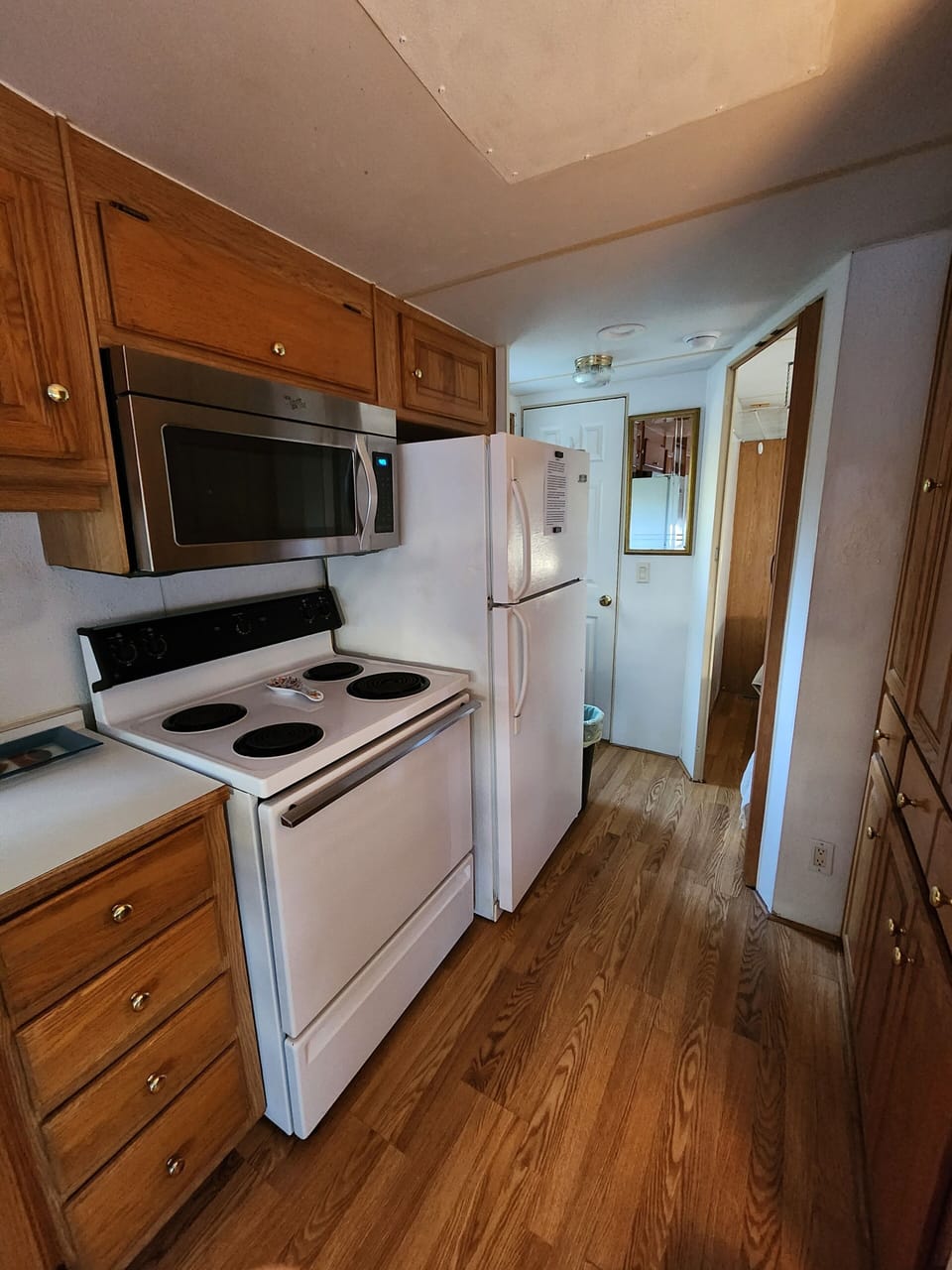 Viw of the kitchen leading to the bed and bathroom.