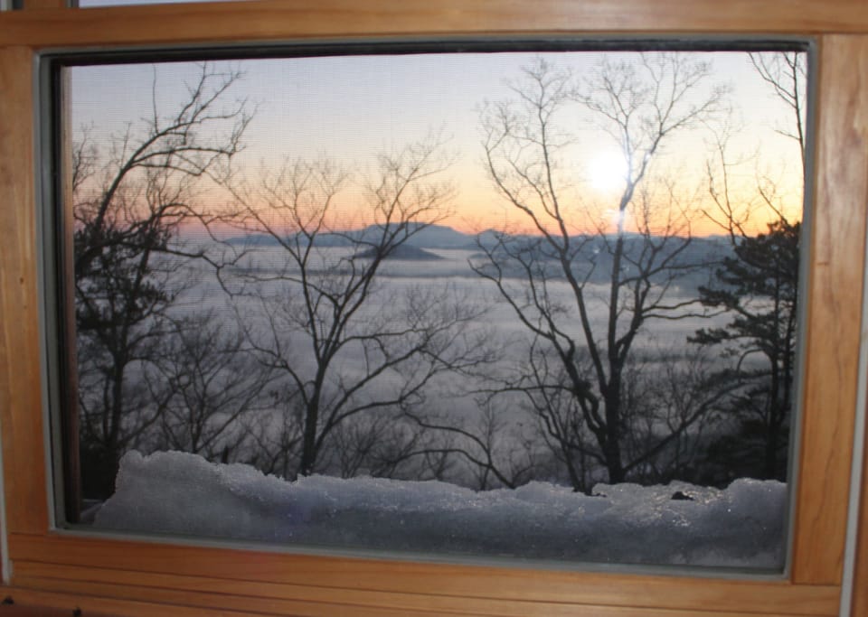 Sunrise over Pigeon Forge hidden in clouds below. For them it was a cloudy morn!