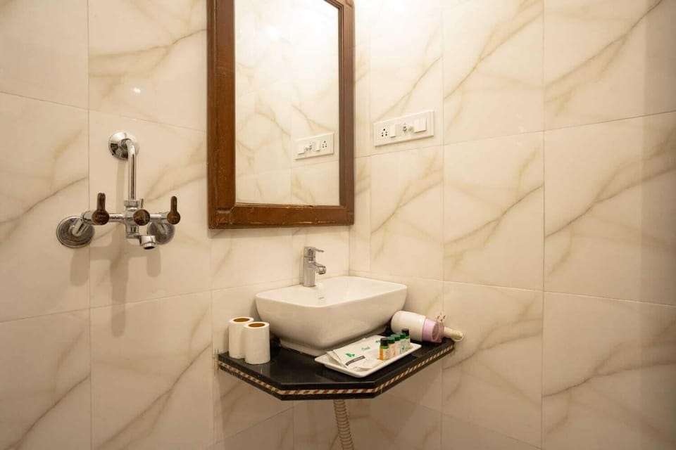Shower, designer toiletries, hair dryer, bidet
