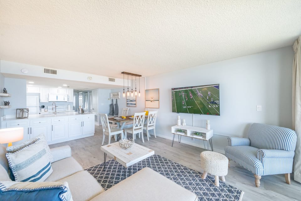 Relax on the cozy sofa, watch the game, or gather for meals