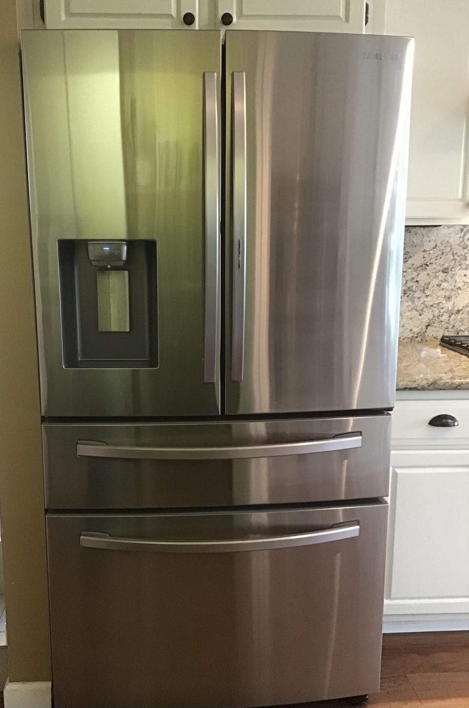Full size three door refrigerator.