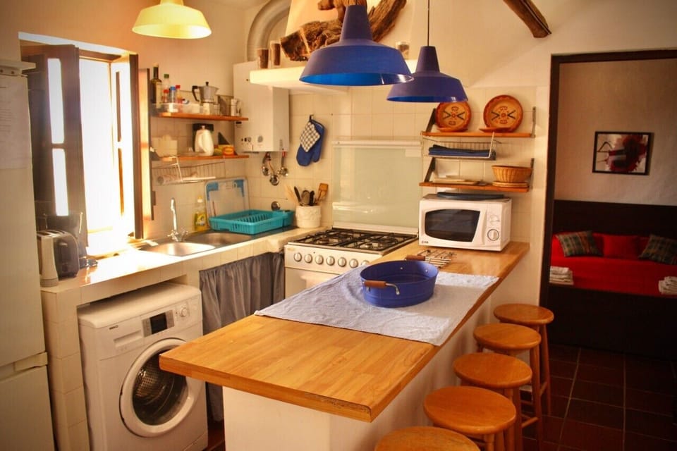 Closer view of kitchen/eating area