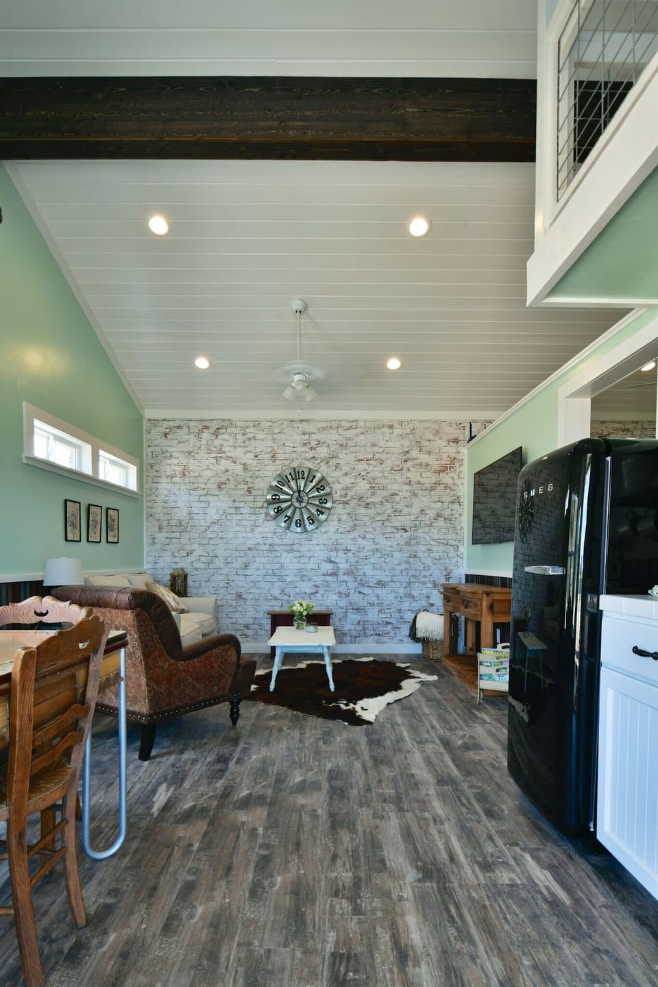 The kitchen and dining area are next to the living