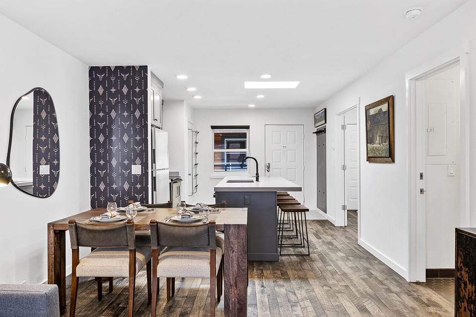 Spacious, modern open condo with tons of natural light and plenty of room for entertaining , lounging and family fun.