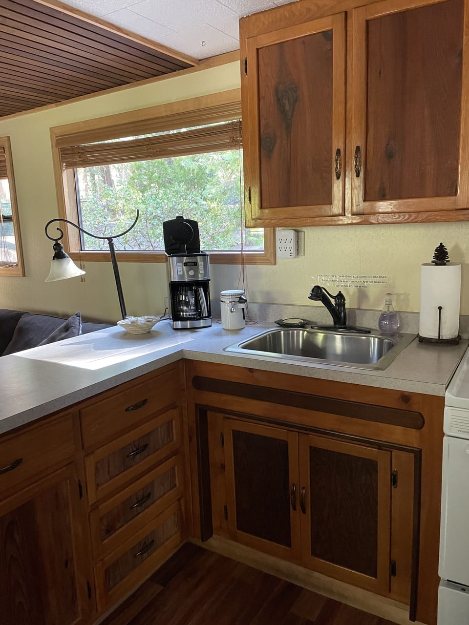 Kitchen with view of the forest. 