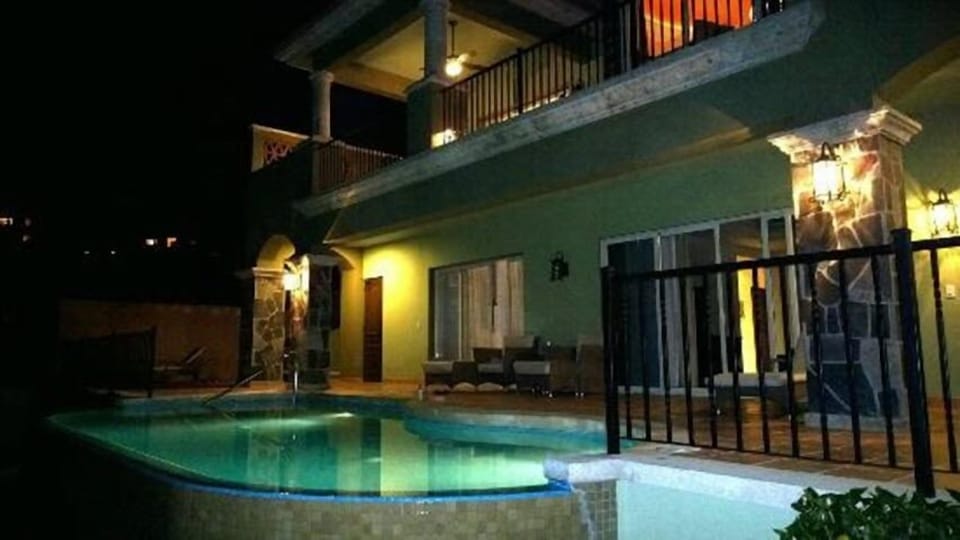 Night view from backyard and pool area