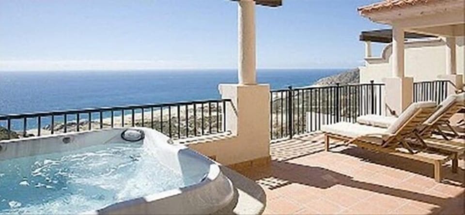 Balcony off top level (showing jacuzzi tub)