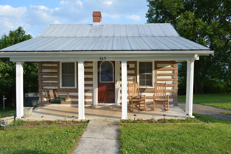 Front porch with rockers and porch swing.