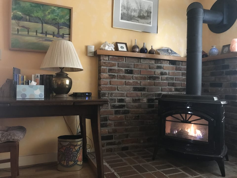 cozy sitting room, desk and love seat