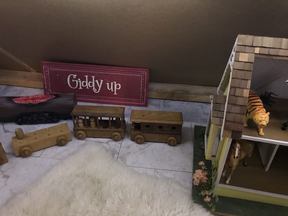 upstairs , under the eves, children's play area