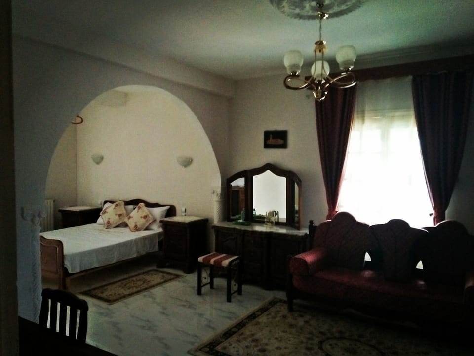 Family Suite, Multiple Beds, Private Bathroom | Individually decorated, blackout drapes, free WiFi, bed sheets