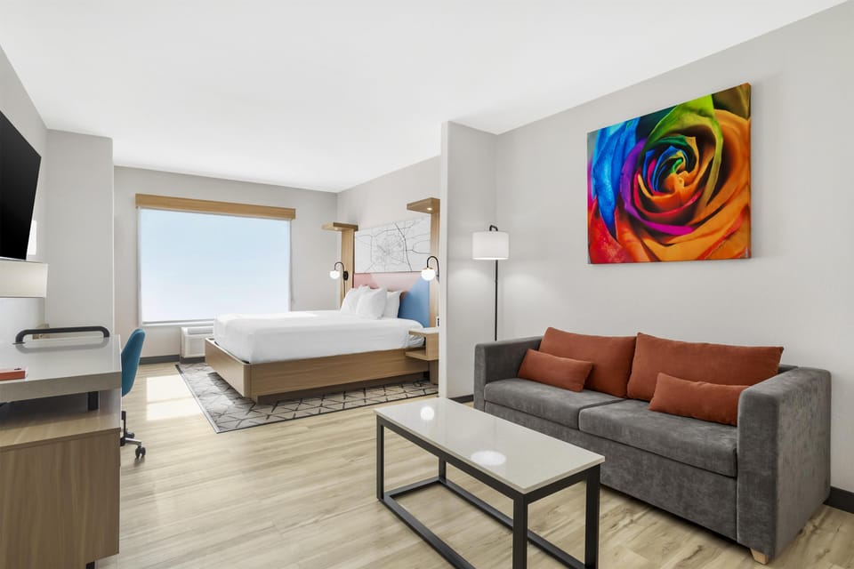 Suite, 1 King Bed, Non Smoking, Refrigerator & Microwave (Shower Only;with Sofabed) | Desk, laptop workspace, iron/ironing board, cribs/infant beds