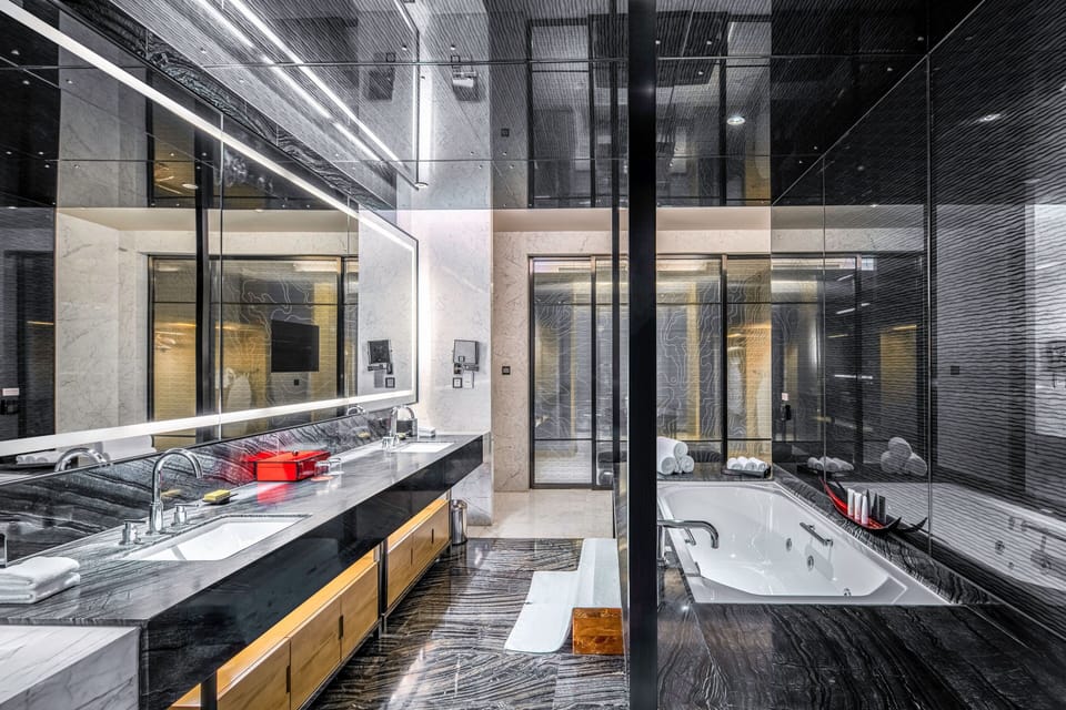 Separate tub and shower, free toiletries, hair dryer, bathrobes