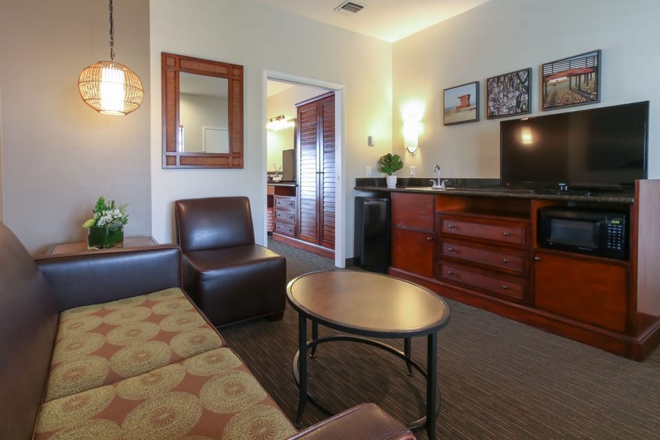 Top Floor Balcony King Suite Sleeper Sofa | 1 bedroom, premium bedding, desk, blackout drapes