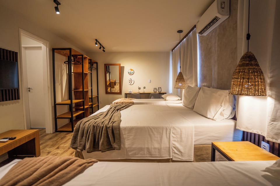 Family Quadruple Room | Minibar, free WiFi, bed sheets