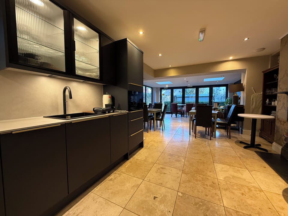 Shared fridge, microwave, coffee/tea maker, electric kettle