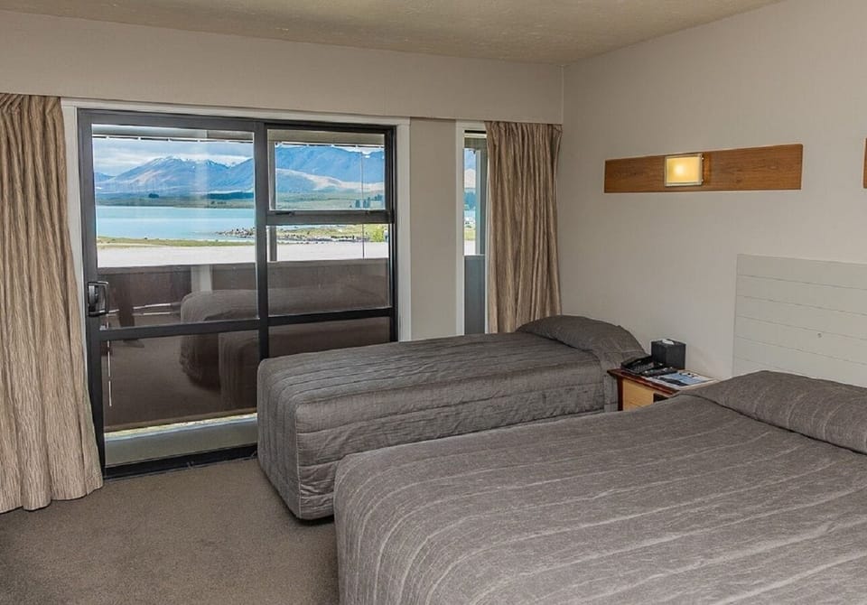 Standard Room, Lake View | Blackout drapes, free cribs/infant beds, free WiFi, bed sheets