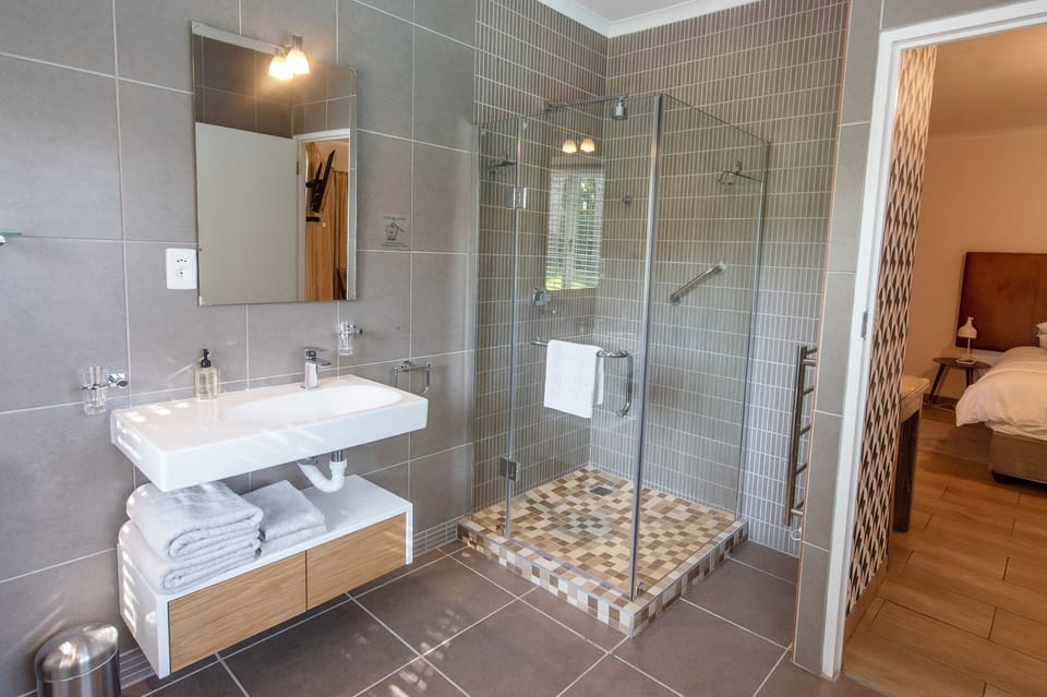 Superior Double Room, Garden Area | Bathroom | Shower, designer toiletries, hair dryer, bathrobes