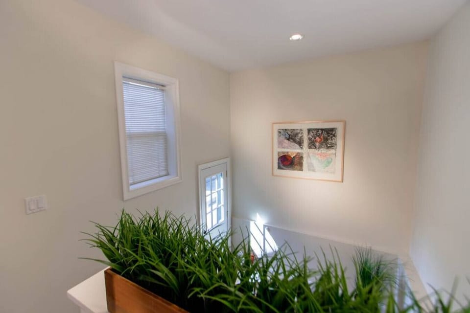 Main floor stairwell leading downstairs
