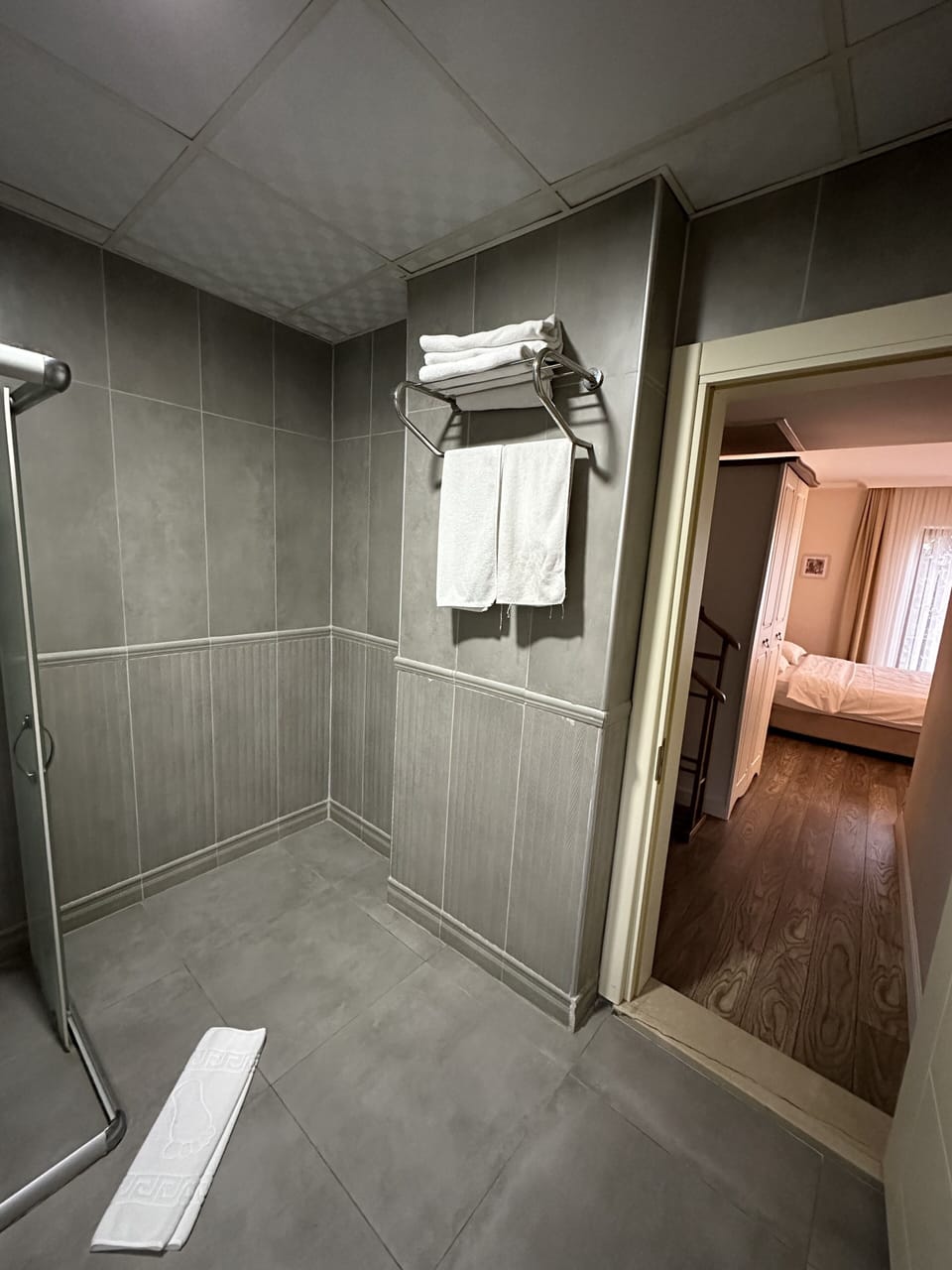 Shower, free toiletries, hair dryer, slippers