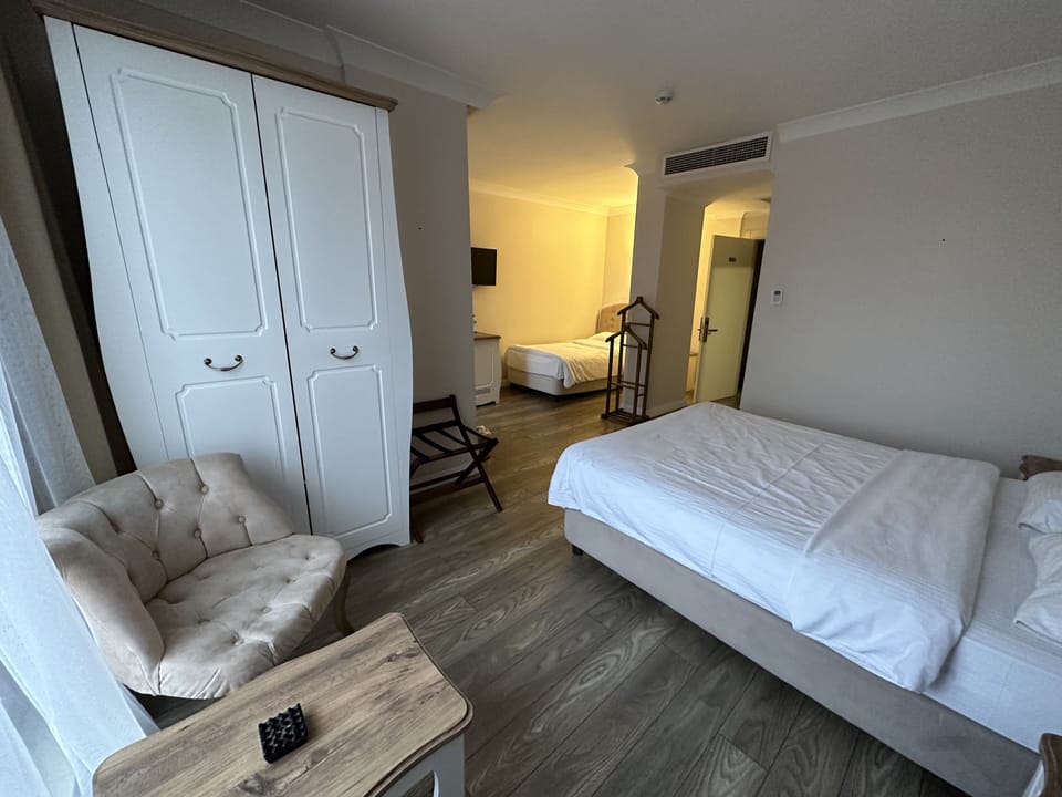 Family Double or Twin Room, Multiple Beds, City View | Premium bedding, minibar, desk, laptop workspace