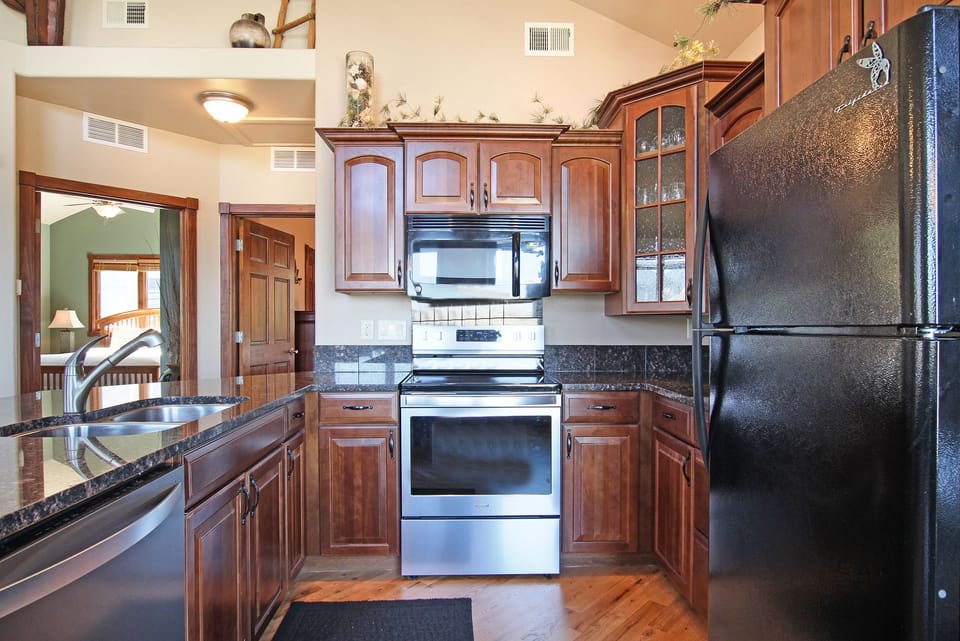 Condo, 2 Bedrooms | Private kitchen | Fridge, microwave, oven, dishwasher