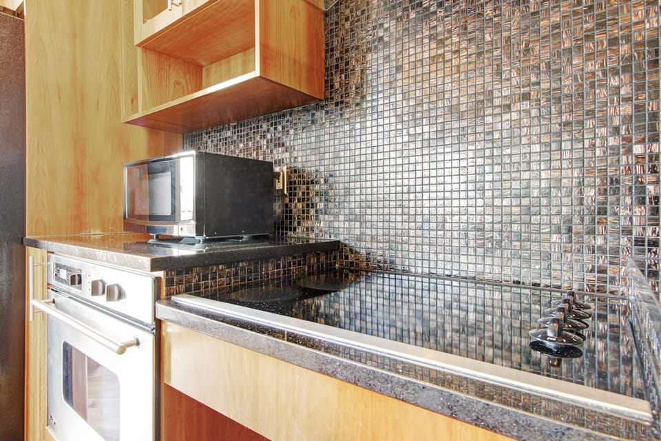 Condo, 2 Bedrooms | Private kitchen | Fridge, microwave, oven, dishwasher