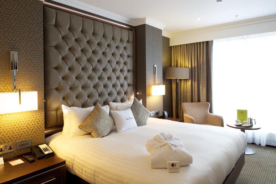 Premium Room, 1 King Bed (Deluxe) | In-room safe, desk, laptop workspace, blackout drapes