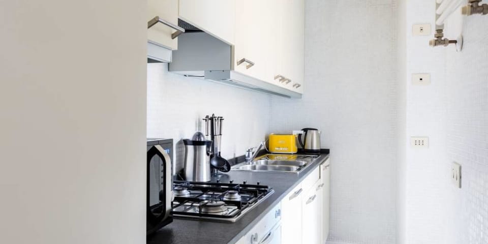 Apartment, 2 Bedrooms | Private kitchen | Fridge, microwave, stovetop, dishwasher