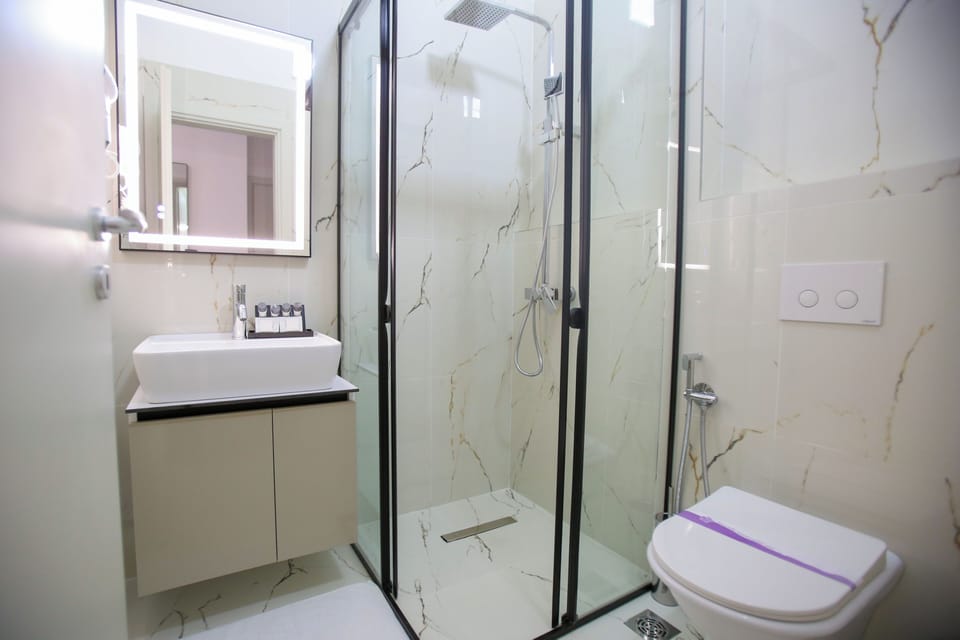 Shower, free toiletries, hair dryer, towels