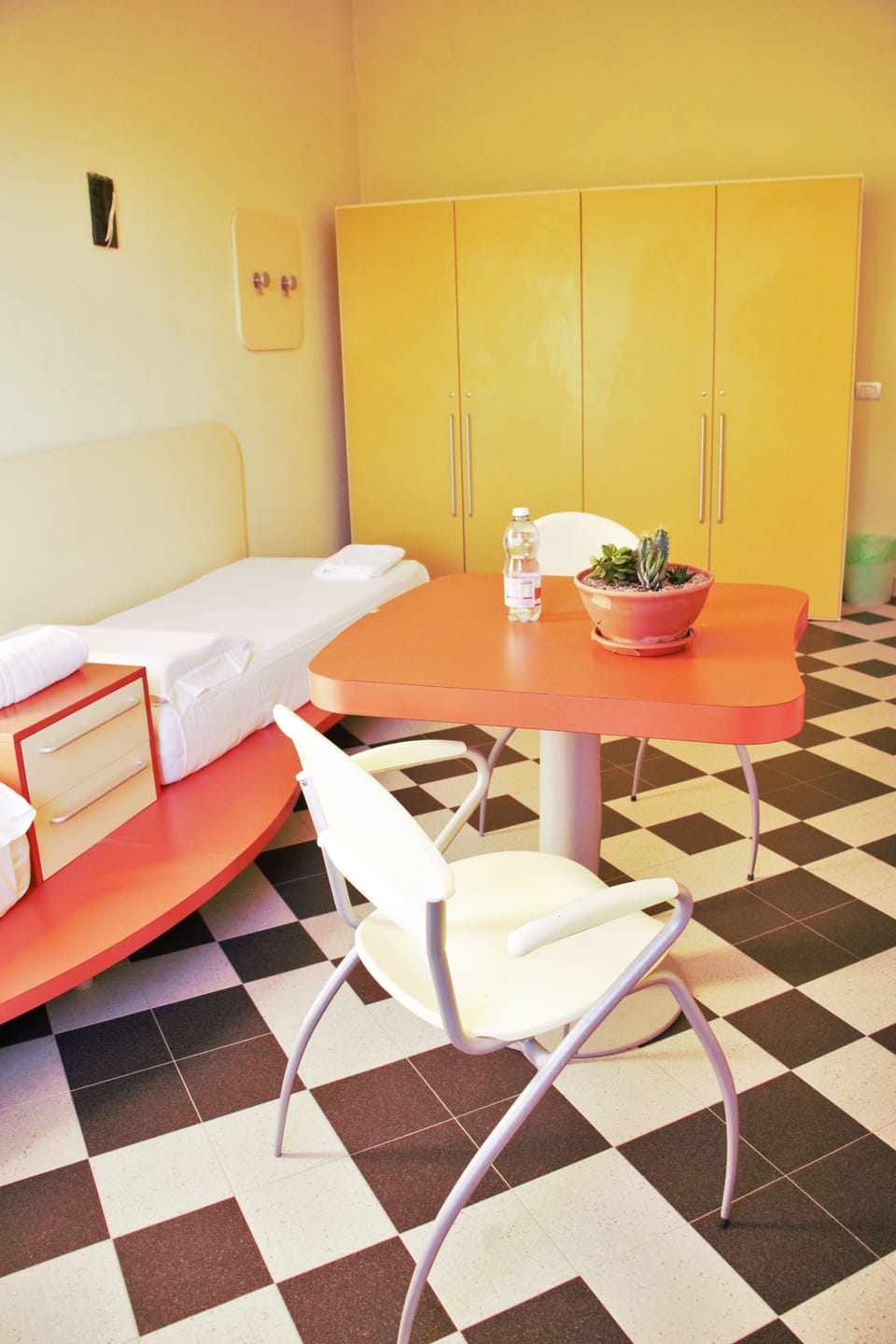 Economy Quadruple Room, Shared Bathroom (Siderite) | Desk, free cribs/infant beds, rollaway beds, bed sheets