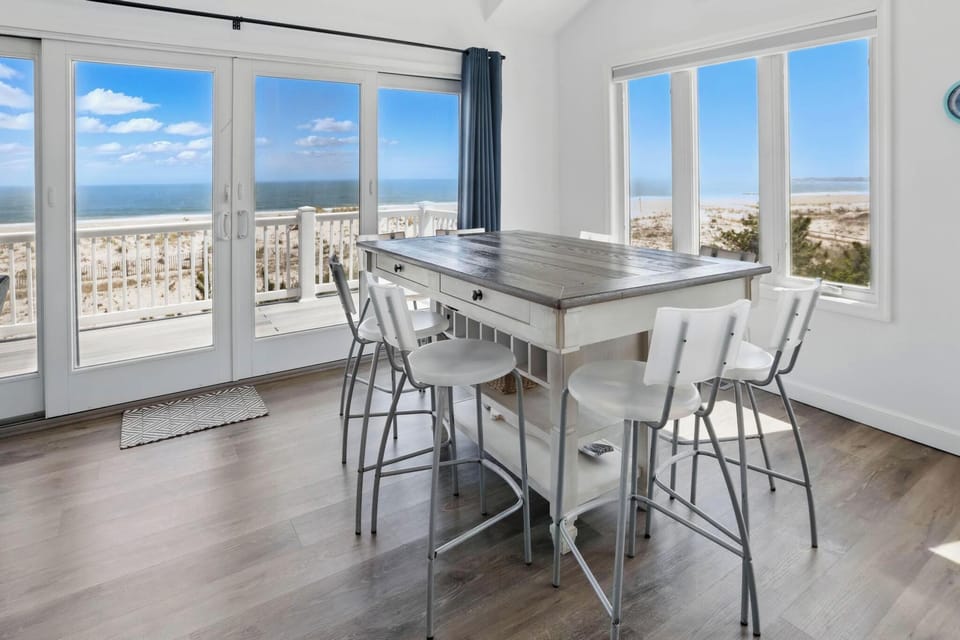 Seats 8 plus the Kitchen island (same height as table)