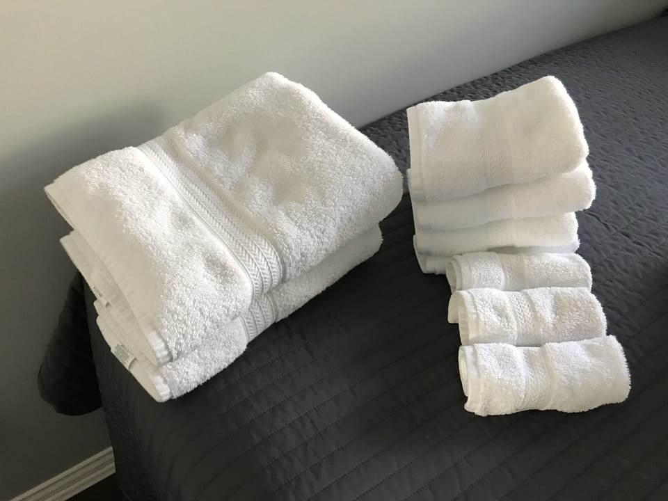 Clean fluffy towels and bedding. No need to bring anything.