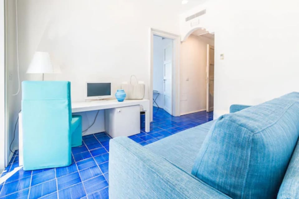 Junior Suite, 1 Bedroom, Balcony, Sea View | Living room | LCD TV, pay movies