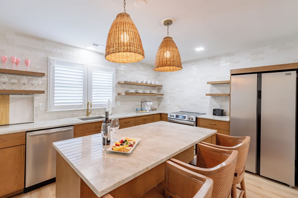 Suite, 2 Bedrooms | Private kitchen | Mini-fridge, microwave, coffee/tea maker, toaster
