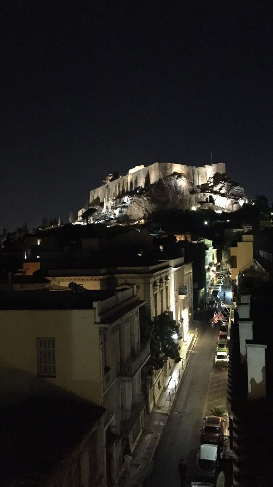 The street in Plaka where the house is and Acropolis in the night
