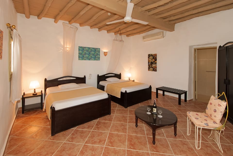Standard Chalet | Minibar, in-room safe, bed sheets