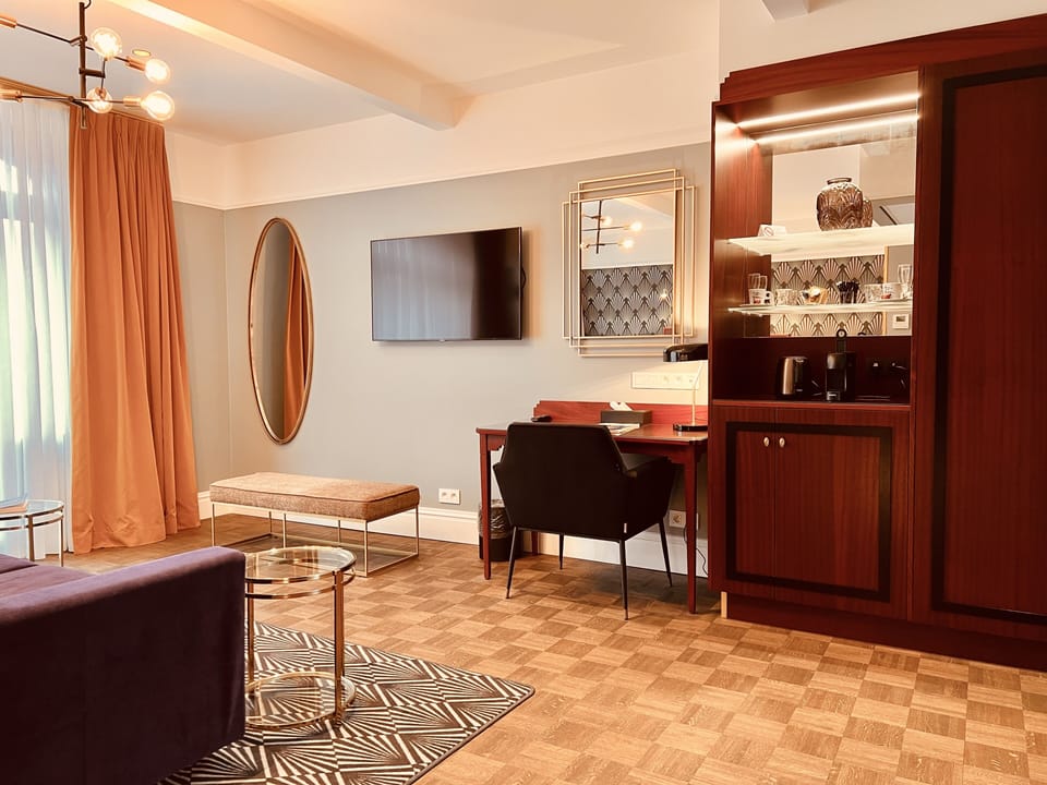 Premium bedding, down comforters, Tempur-Pedic beds, free minibar