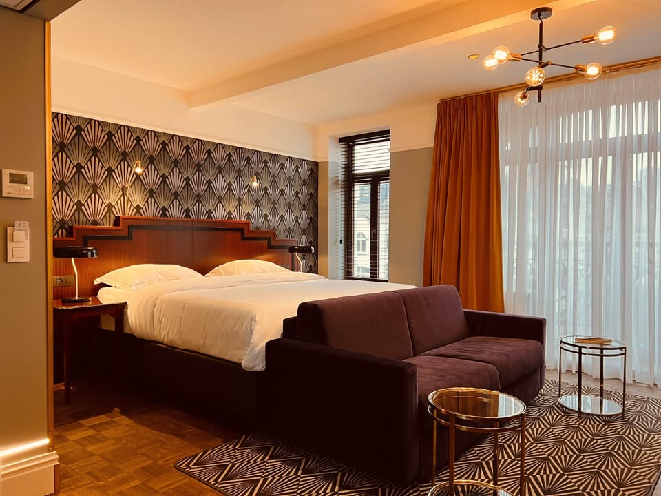 Premium bedding, down comforters, Tempur-Pedic beds, free minibar