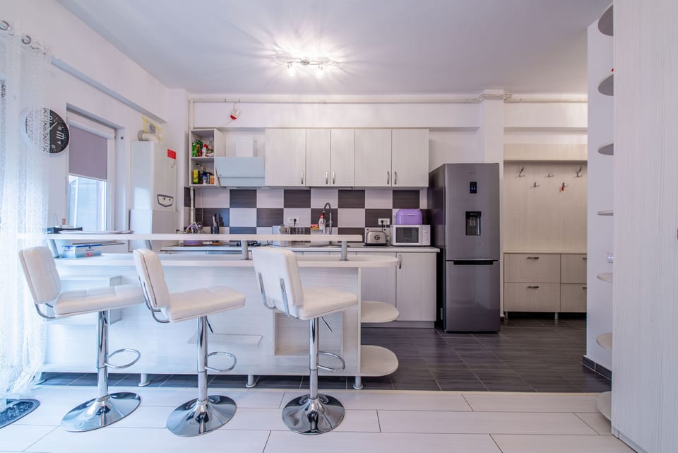 Deluxe Studio | Private kitchen | Full-size fridge, microwave, oven, stovetop