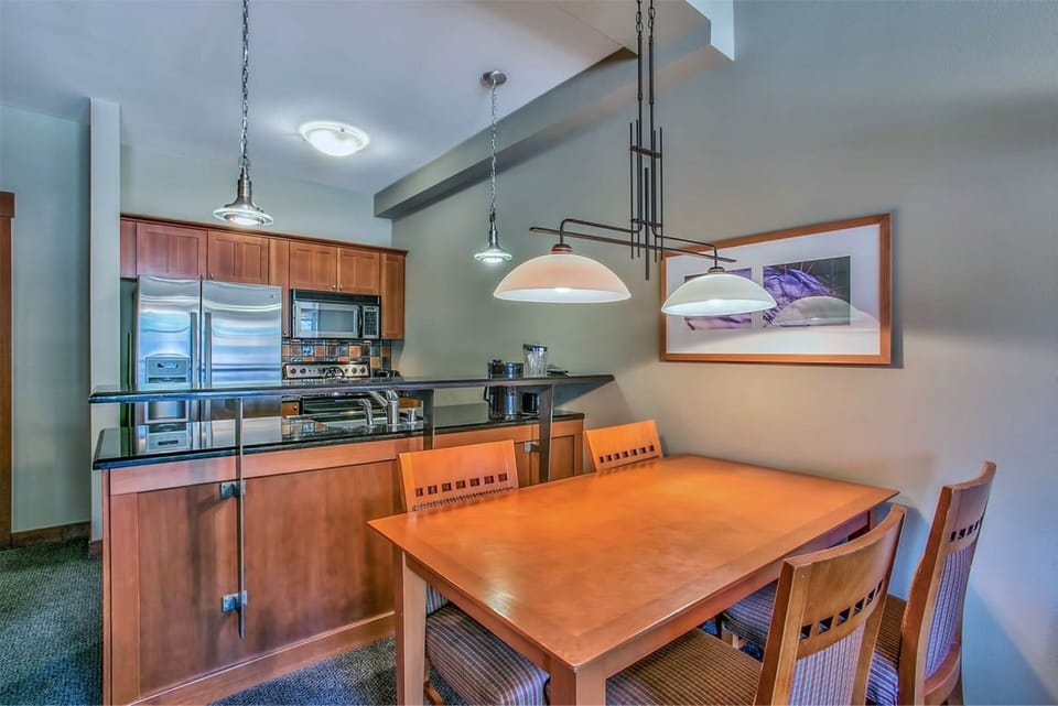 Dining area and full kitchen.