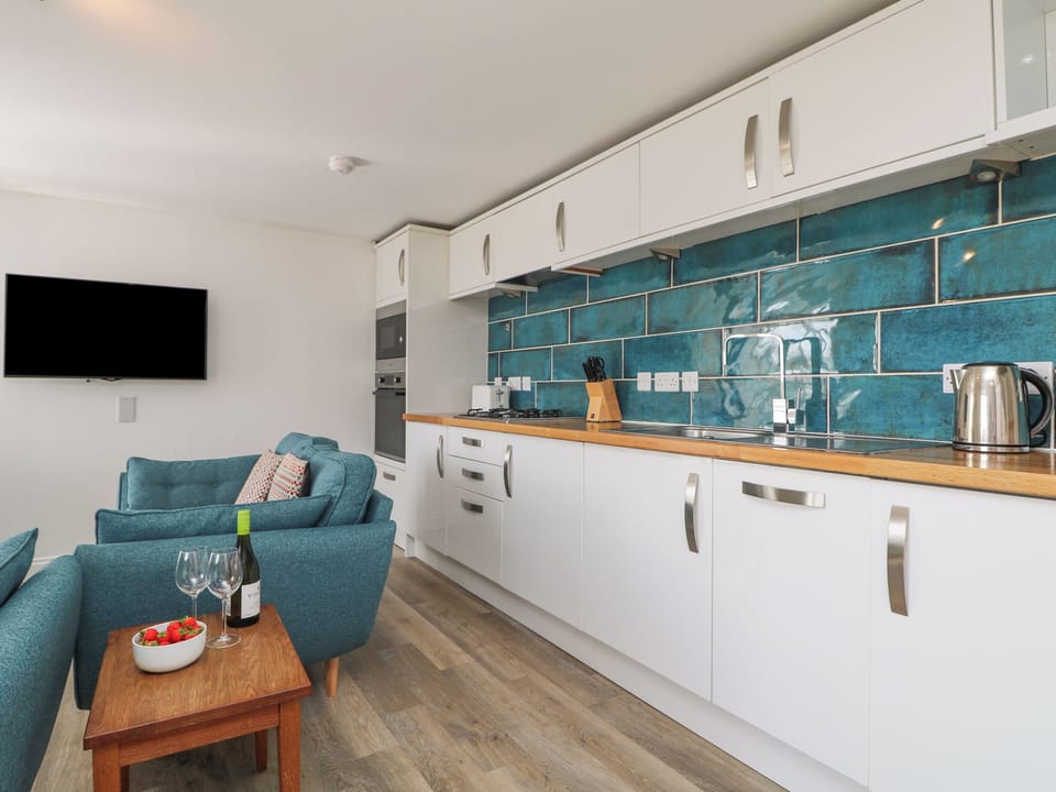 Cottage | Private kitchen | Microwave, stovetop, dishwasher, highchair