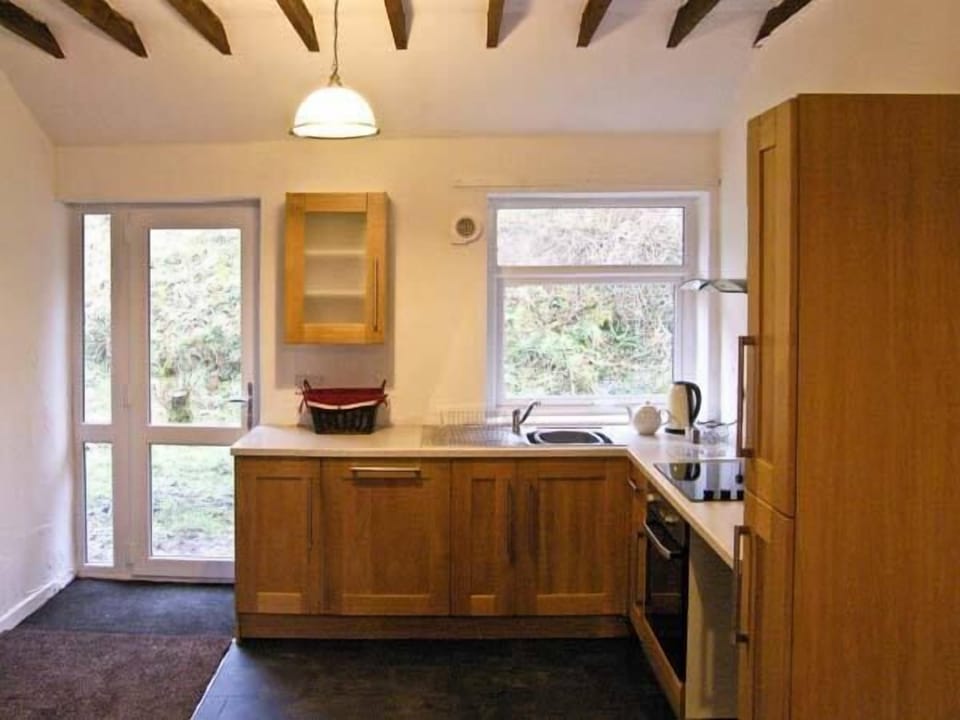 Cottage | Private kitchen | Stovetop, dishwasher, highchair, cookware/dishes/utensils