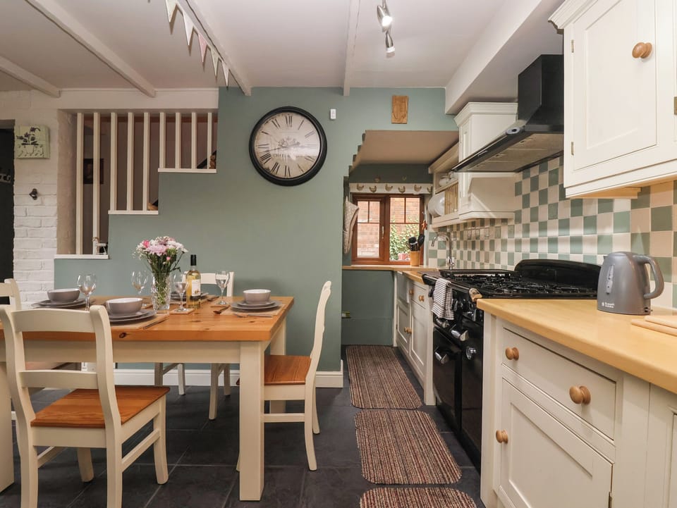 Fridge, microwave, toaster, cookware/dishes/utensils