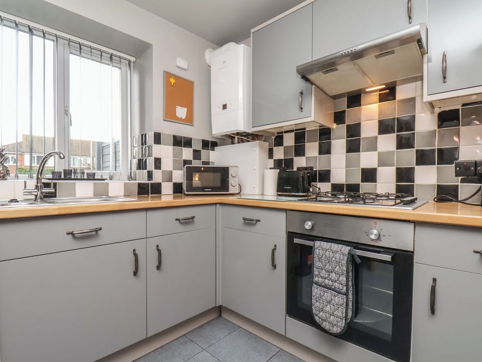 Cottage | Private kitchen | Highchair, cookware/dishes/utensils